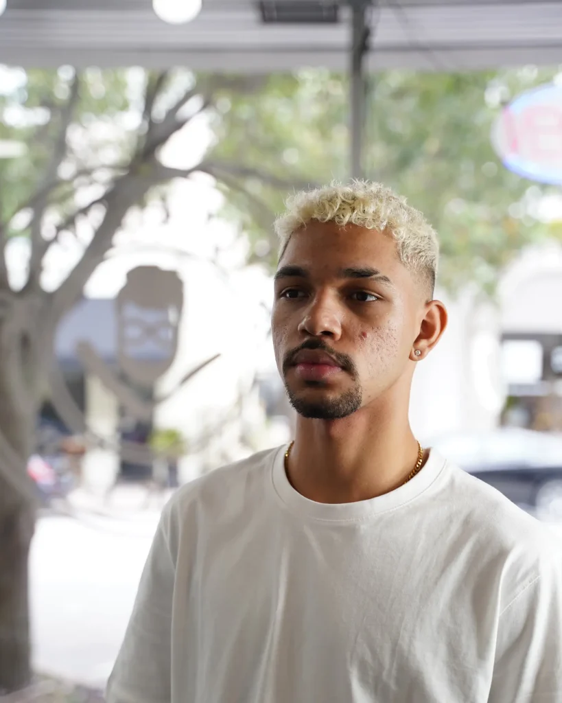 Bleached blonde crop with a skin fade at Alchemy Hair Lab in Coral Gables