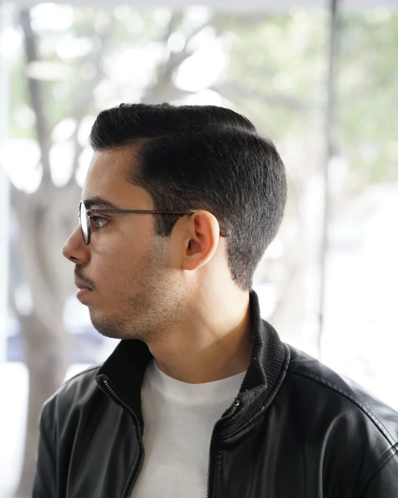 Profile of a classic side part showing the blended taper by Luis Mosquera
