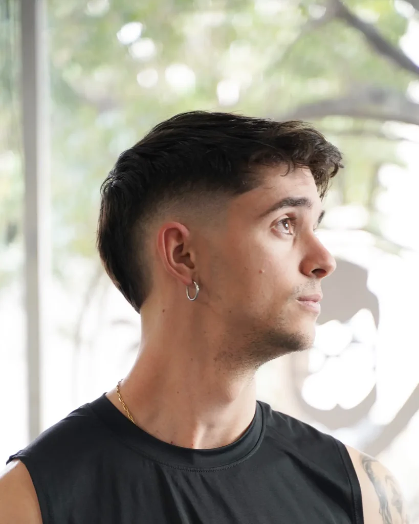 Textured mullet with a mid drop fade, cut by Luis Mosquera